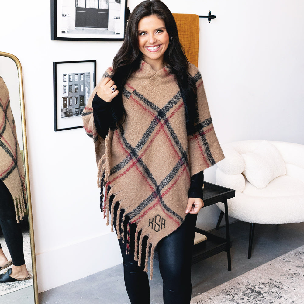 plaid poncho outfit on girl with leggings