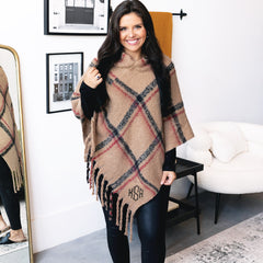 plaid poncho outfit on girl with leggings