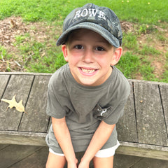 camo kids baseball hat on rowe