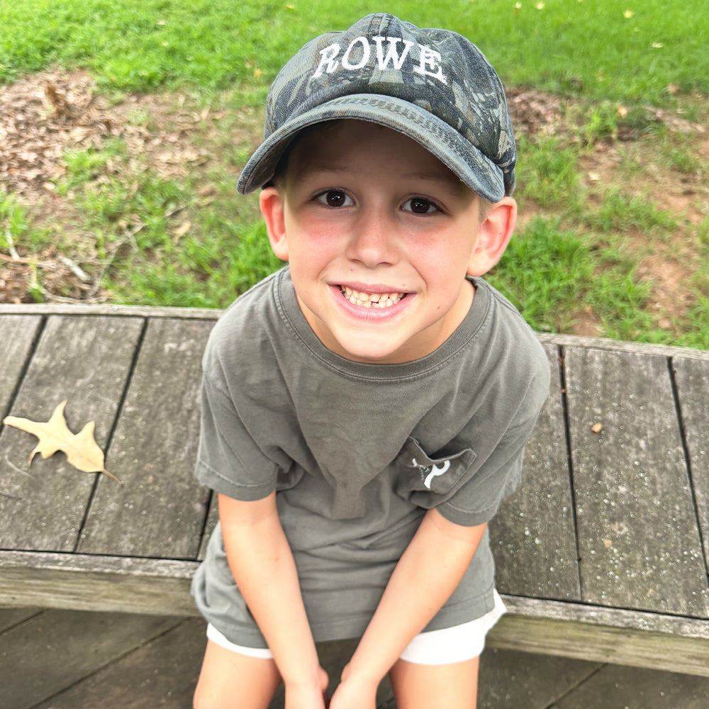 camo kids baseball hat on rowe