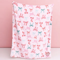 christmas coquette plush blanket in hands