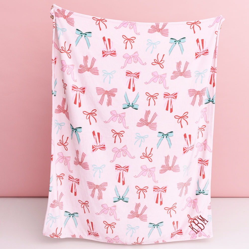 christmas coquette plush blanket in hands