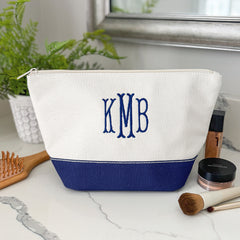 classic canvas cosmetic bag on bathroom counter straight on