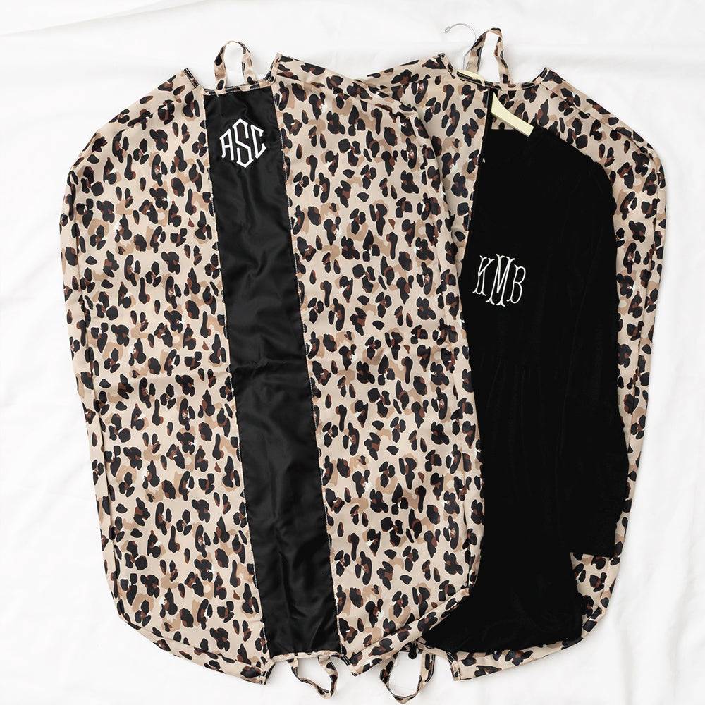 classic cheetah packable garment bag flatlay