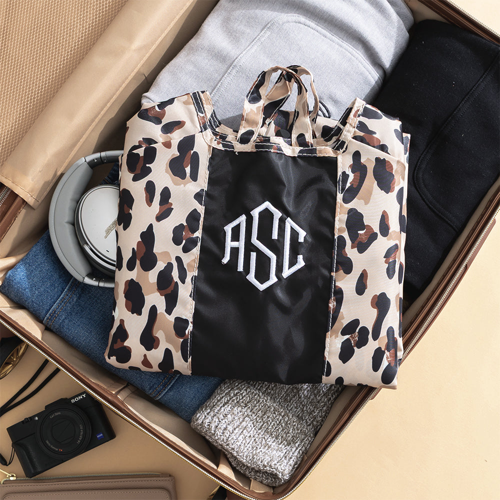 classic cheetah packable garment bag folded up