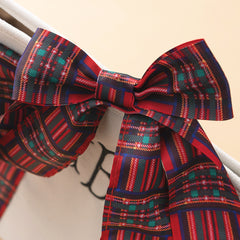 close up of bow on monogrammed plaid tote in red plaid 