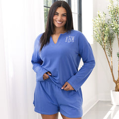 close up of girl wearing cornflower notch pajama set