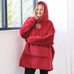 close up of girl wearing monogrammed blanket hoodie 