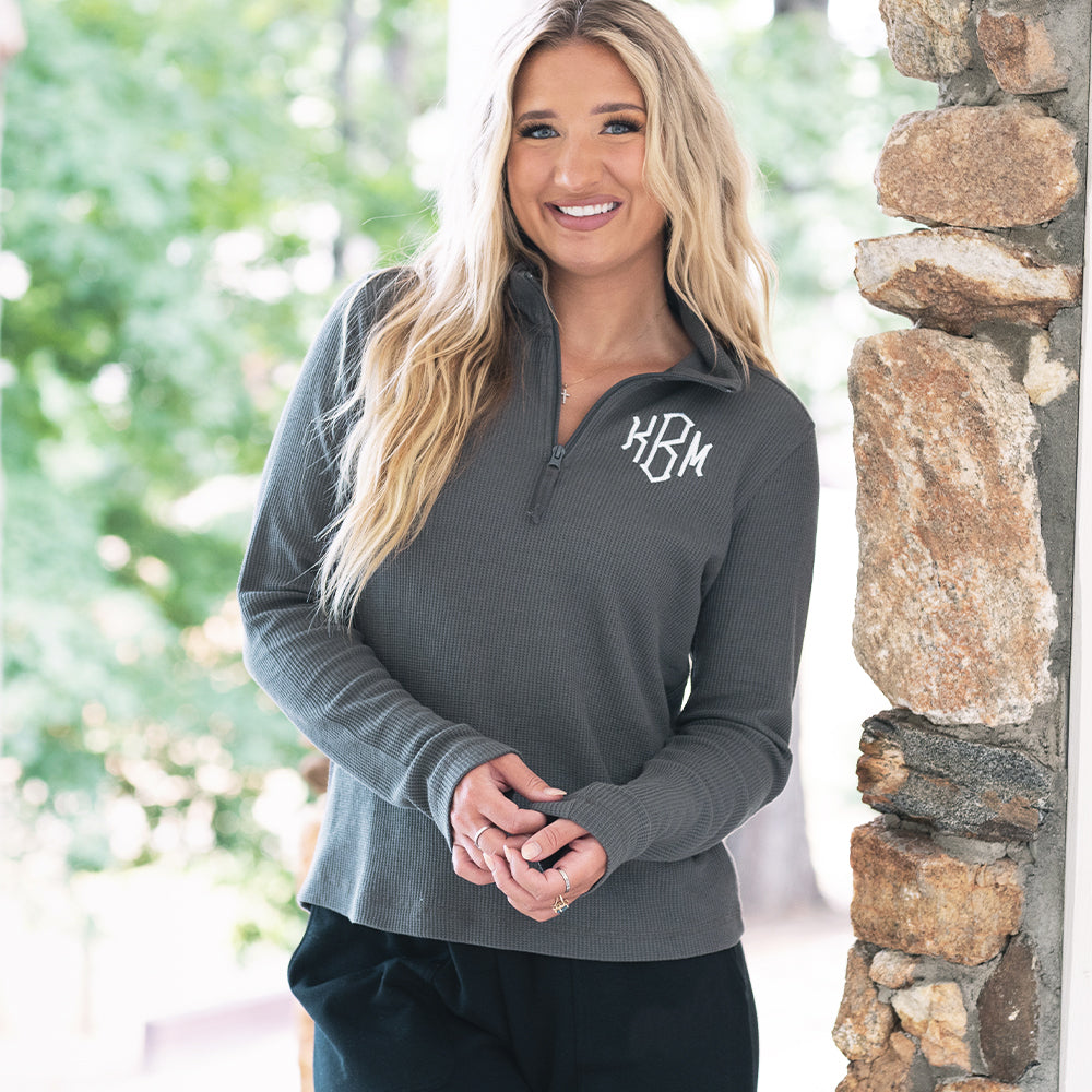 close up of girl wearing monogrammed lightweight waffle quarter zip pullover in charcoal 
