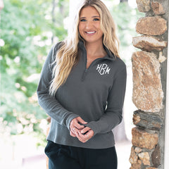 close up of girl wearing monogrammed lightweight waffle quarter zip pullover in charcoal 
