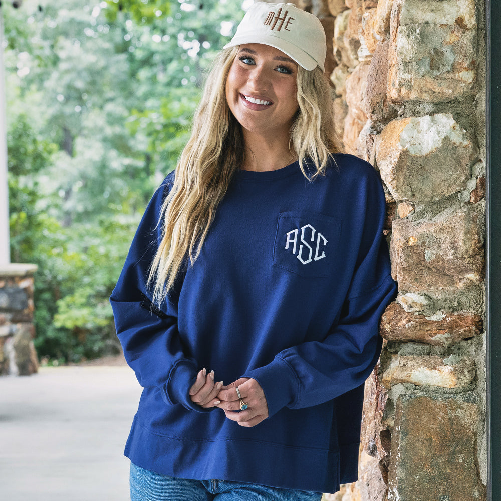 close up of girl wearing navy personalized oversized sweatshirt 