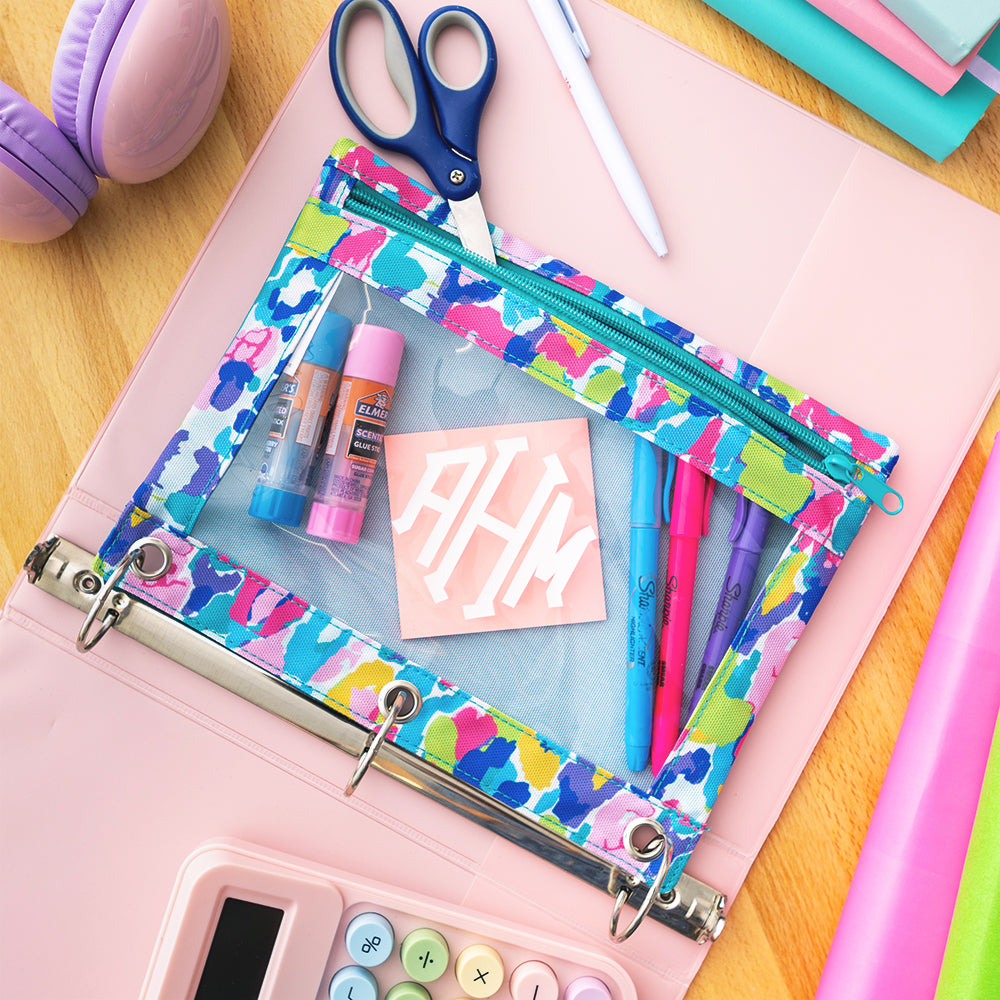 close up of monogrammed binder pouch in watercolor cheetah 
