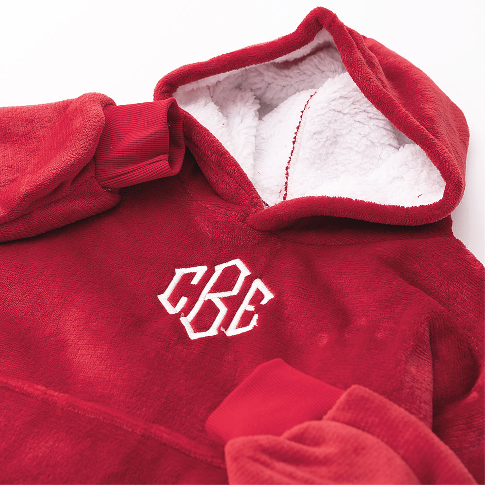 close up of monogrammed blanket hoodie in crimson 