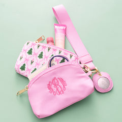 close up of monogrammed christmas lattice two pouch wristlet 