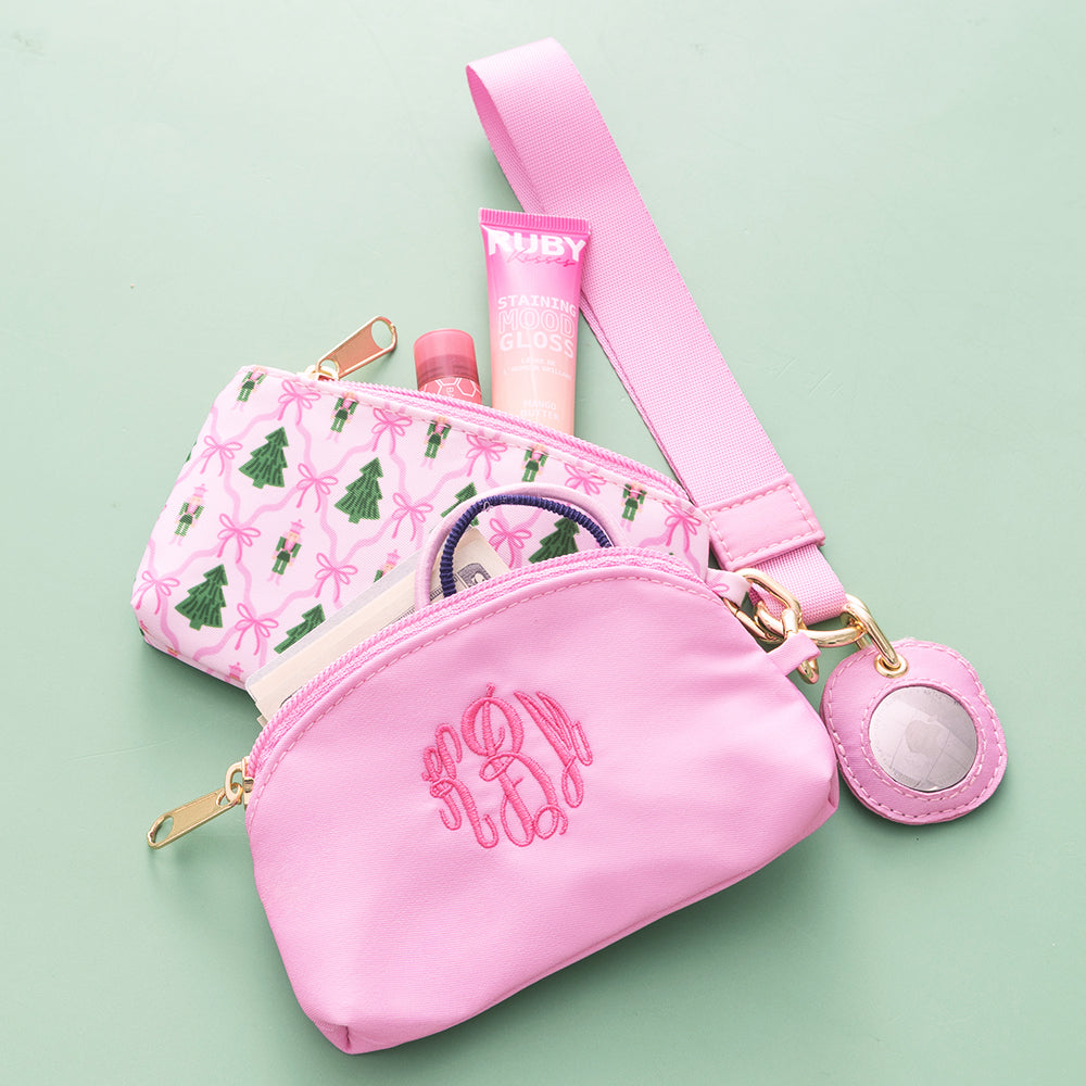 close up of monogrammed christmas lattice two pouch wristlet 