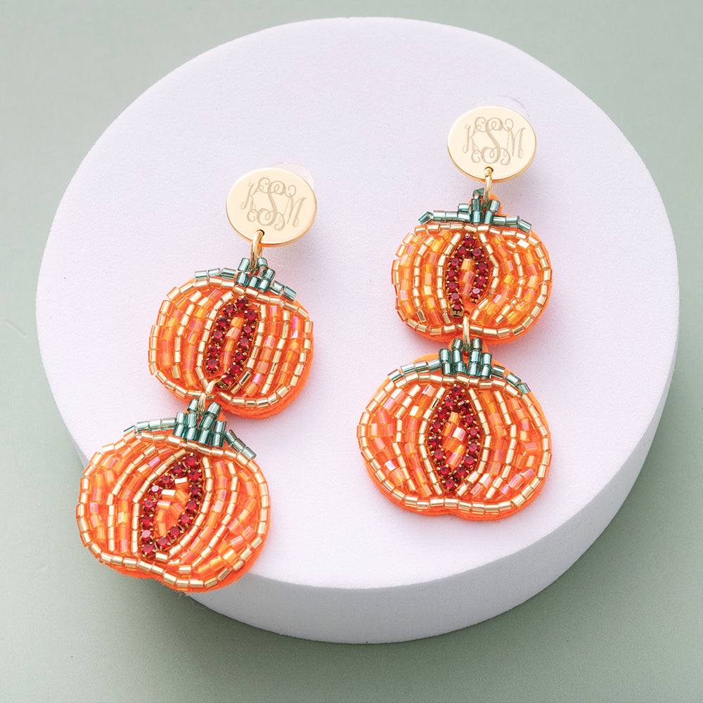 close up of personalized  pumpkin earrings 