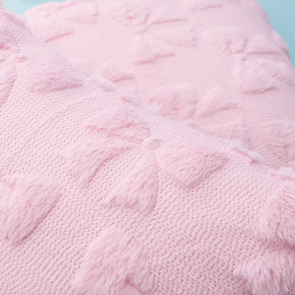 close up of pink bow pillow sham