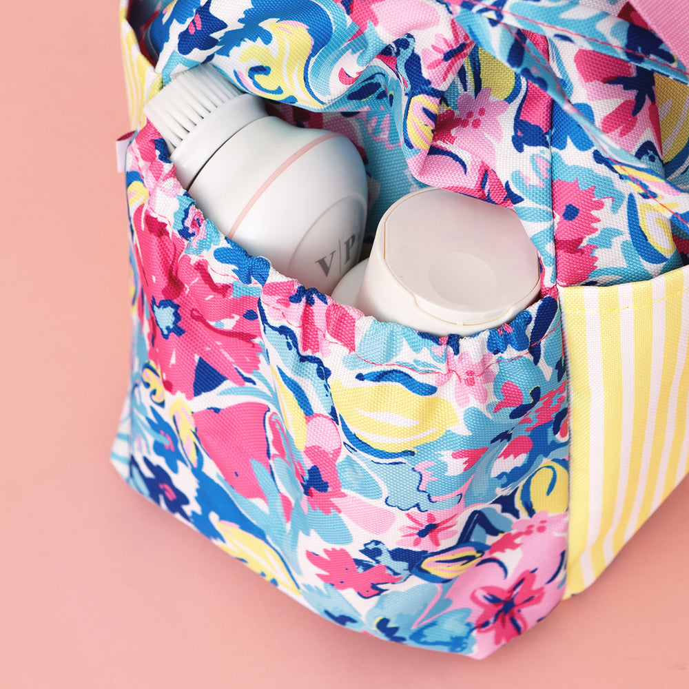 close-up of floral toiletry bag side exterior pocket