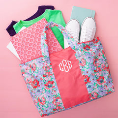 coral botanical packable weekend duffel flatlay