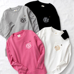 crewneck sweatshirt in white pink grey and black on white sheet