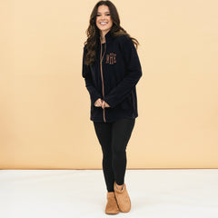 black fleece jacket on peyton