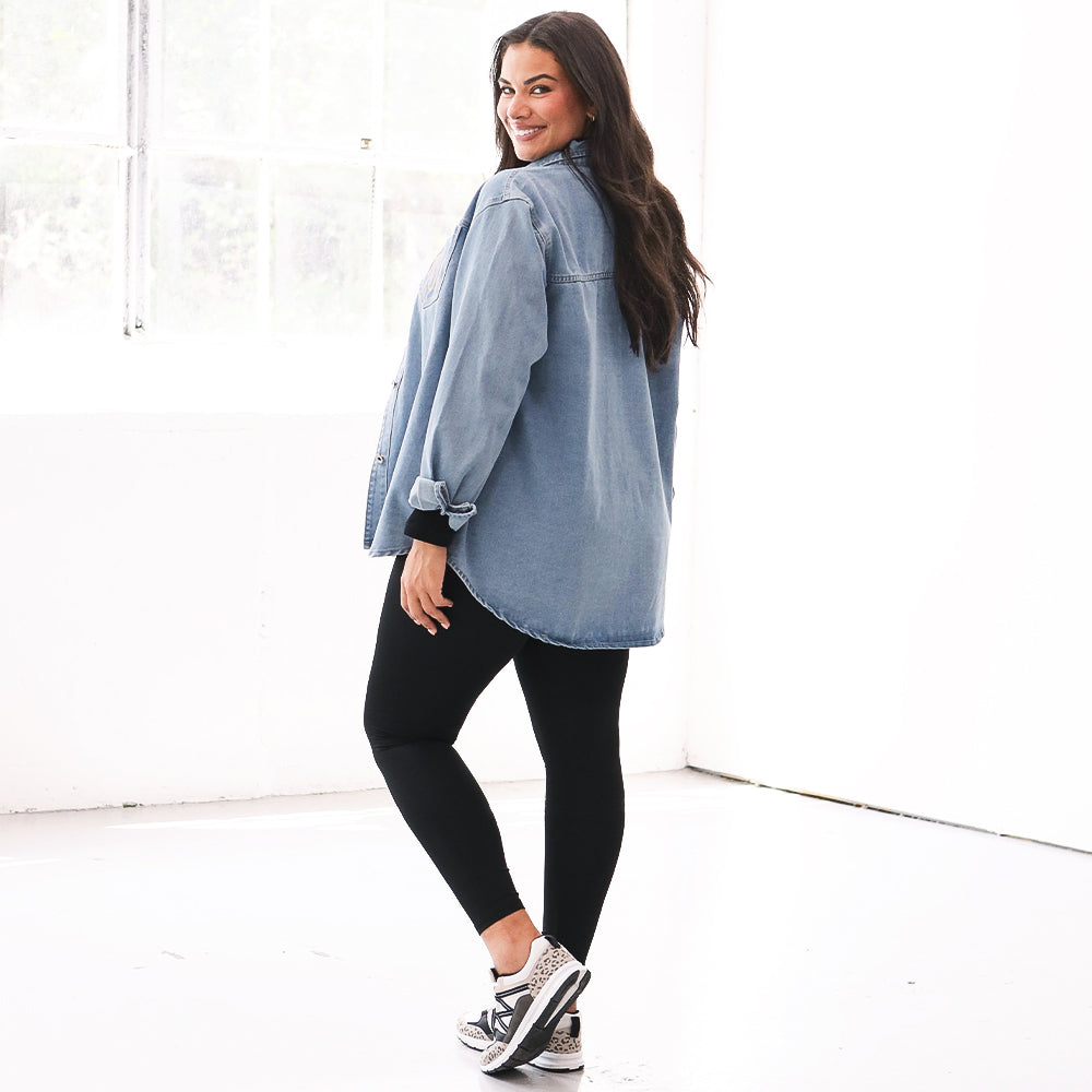 back of light wash monogrammed denim shacket