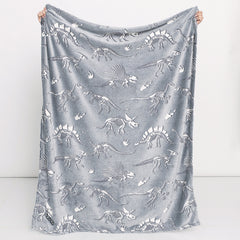dinosaurs skeletons personalized kids plush blanket held up 