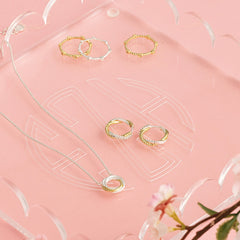 pave cable hoop earrings with cable necklace and ring stack