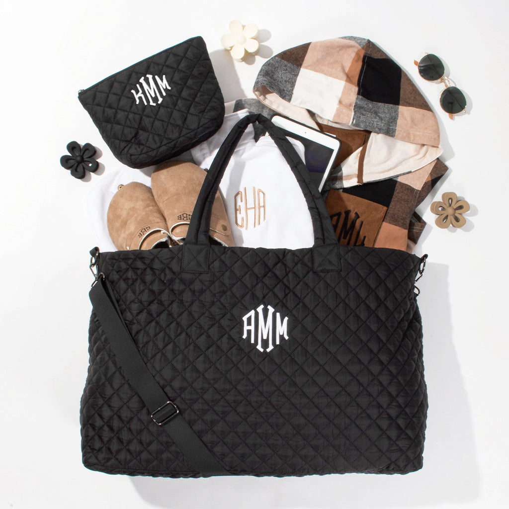 diamond weekender and cosmetic case in black with clogs and shacket