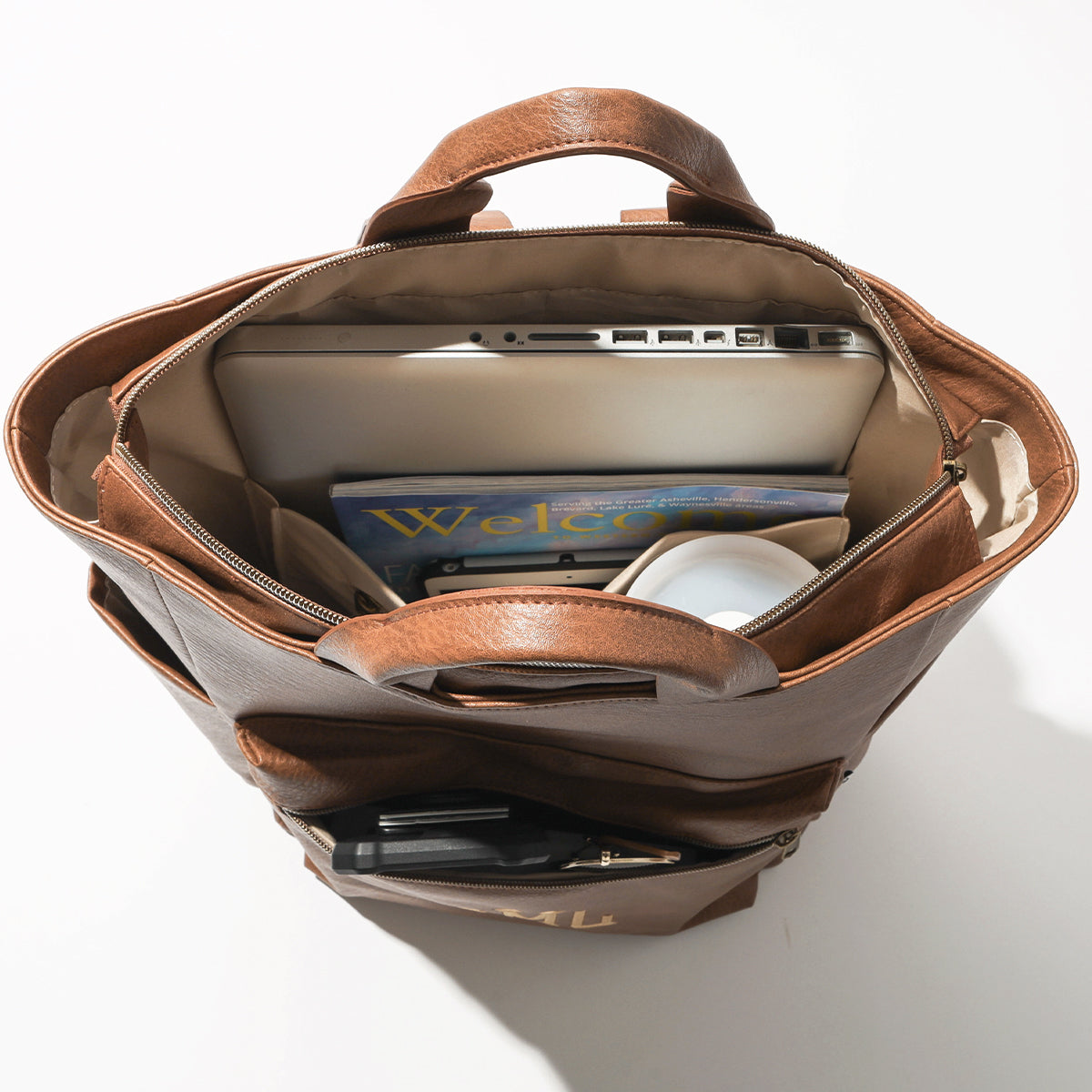 brown commuter backpack inside shot