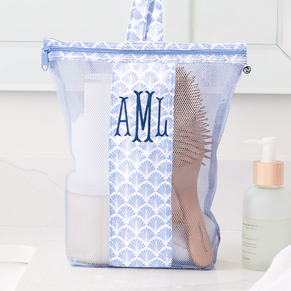 blue shells monogrammed shower bag on bathroom counter