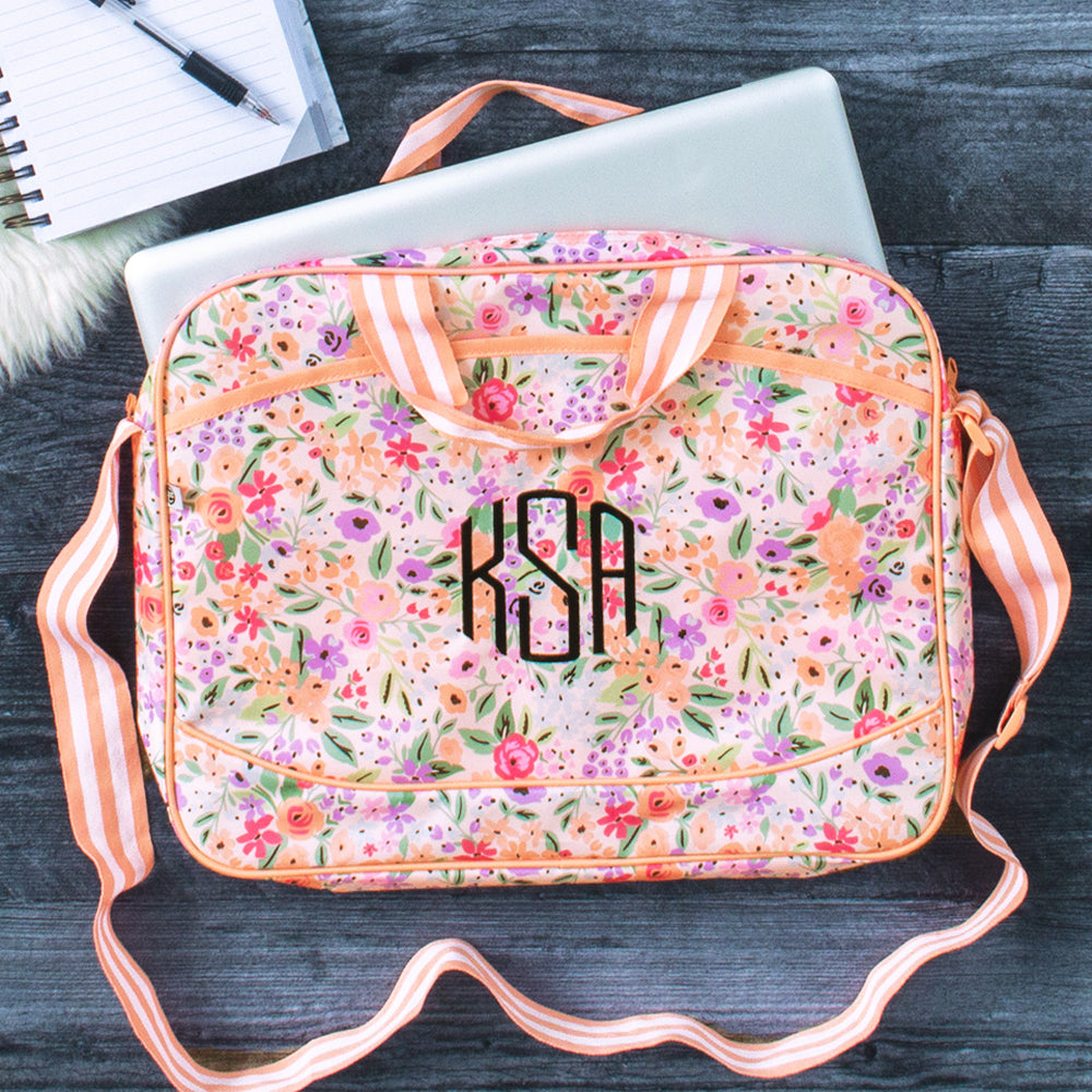 personalized floral Laptop Bag with silver laptop and notepad