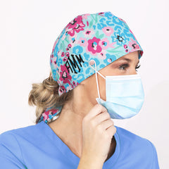monogrammed scrub cap with mask attached to buttons