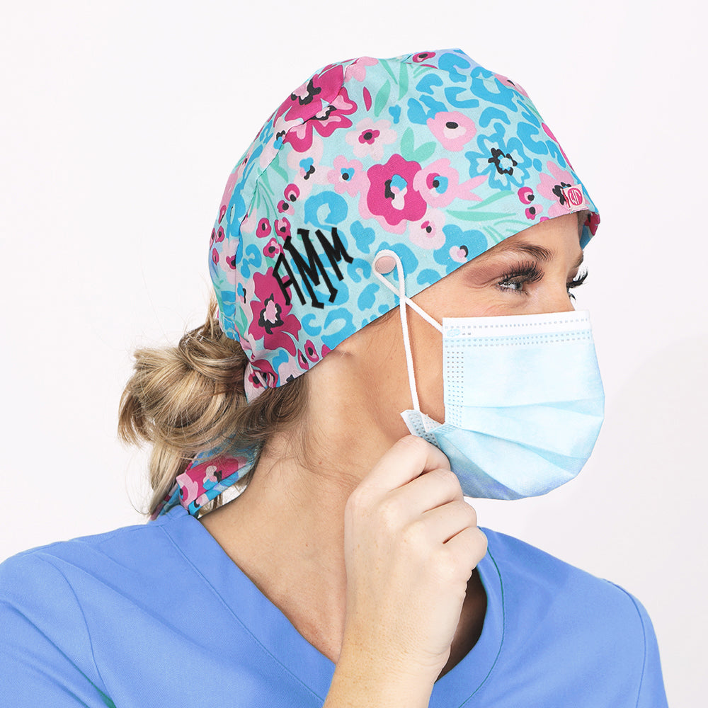 monogrammed scrub cap with mask attached to buttons