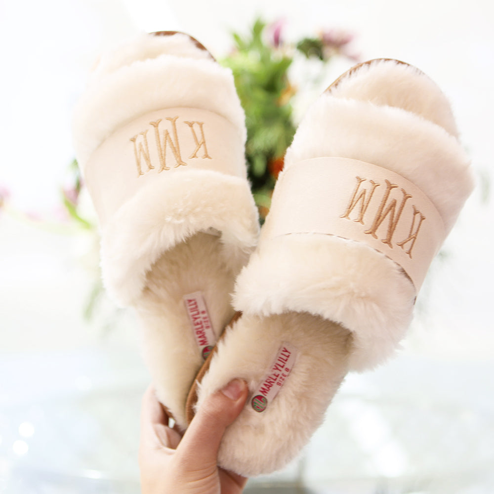Fuzzy ivory slippers in lobby