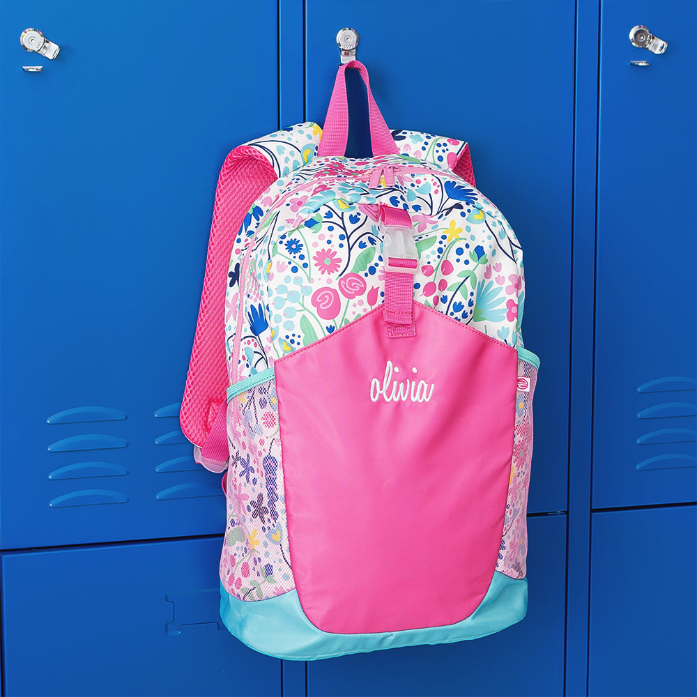flower power basic backpack hanging on locker 