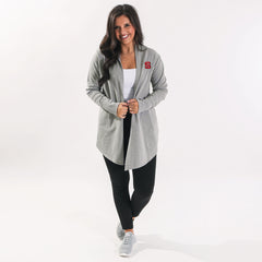 model wearing nc state grey cardigan with sneakers