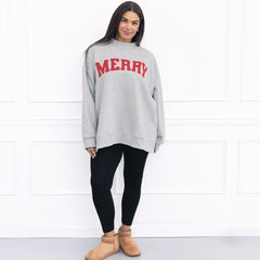 girl wearing heathered grey merry mockneck sweatshirt 