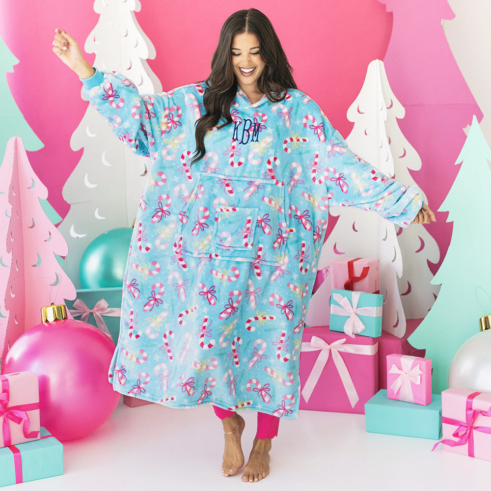 girl wearing candy cane cutie monogrammed xl blanket hoodie