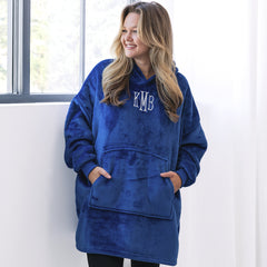 girl wearing monogrammed blue blanket hoodie with leggings 