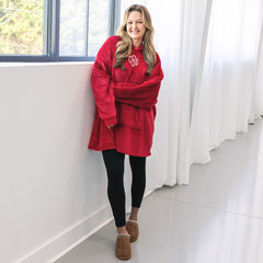 girl wearing monogrammed crimson blanket hoodie with leggings 