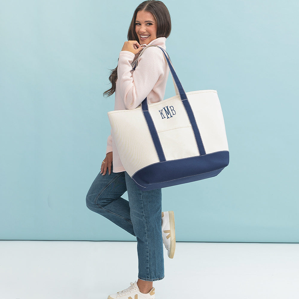 girl wearing large canvas tote on shoulder