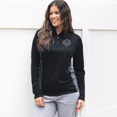girl wearing monogrammed quarter zip pullover in black and grey 