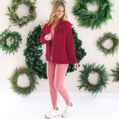 girl wearing monogrammed quilted red hoodie jacket with plaid athletic set