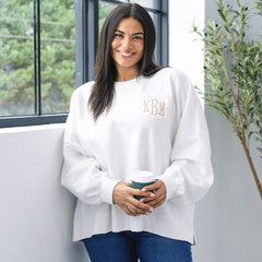 girl wearing personalized ivory oversized sweatshirt 