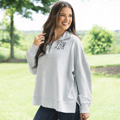 girl wearing personalized oversized quarter zip pullover in heathered grey 