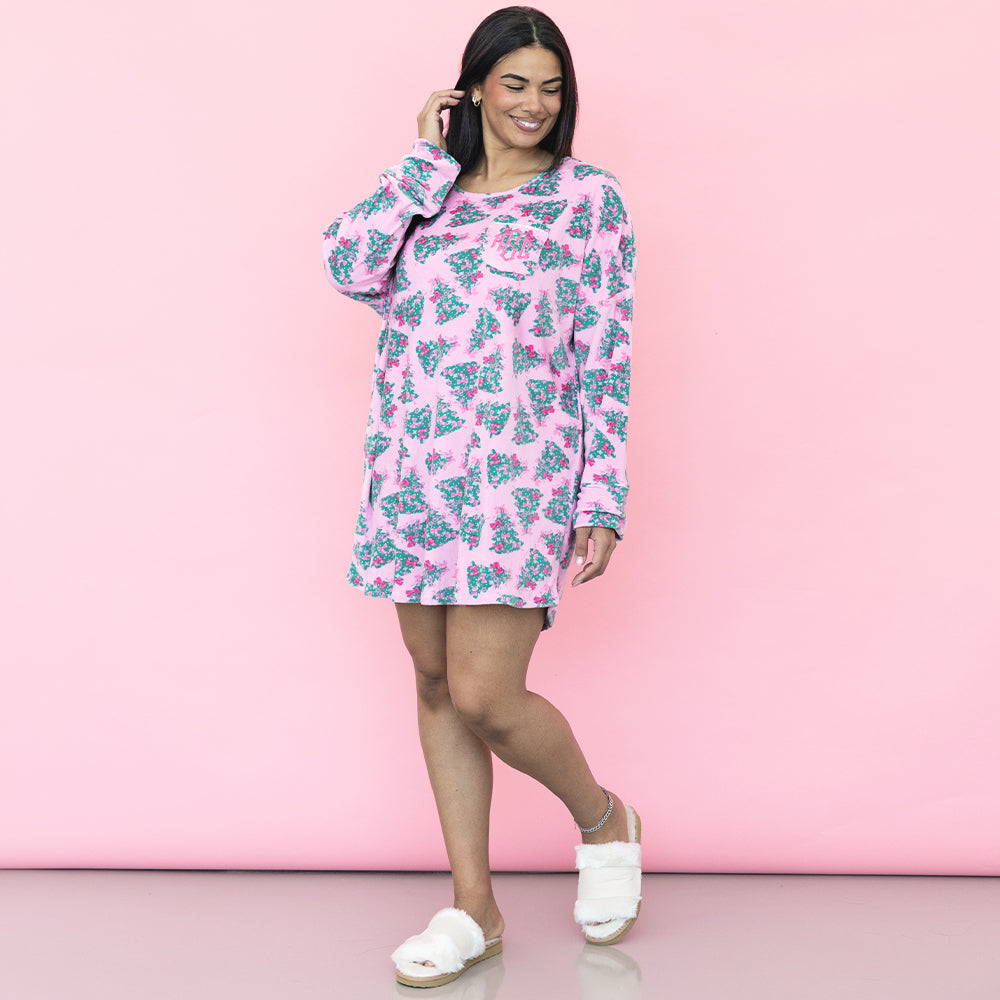 girl wearing personalized pink christmas trees nightgown 