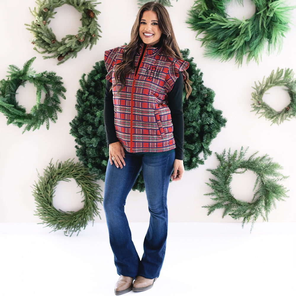 girl wearing personalized quilted ruffle sleeve vest in red plaid 