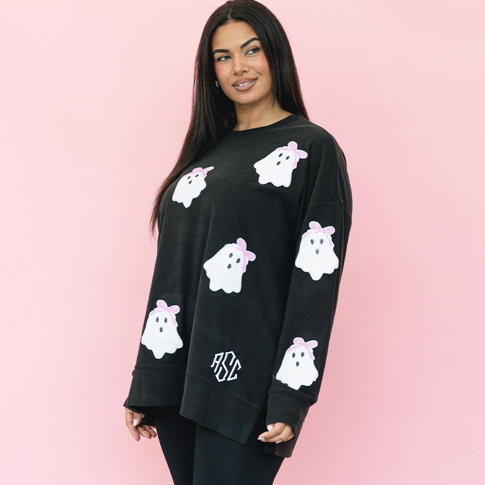 girl wearing personalized sequin ghost sweatshirt in black 