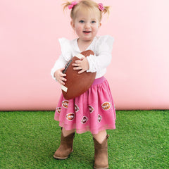 girl wearing pink sequin footballs tutu skirt 